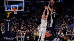 Jokic-guards-Wemby